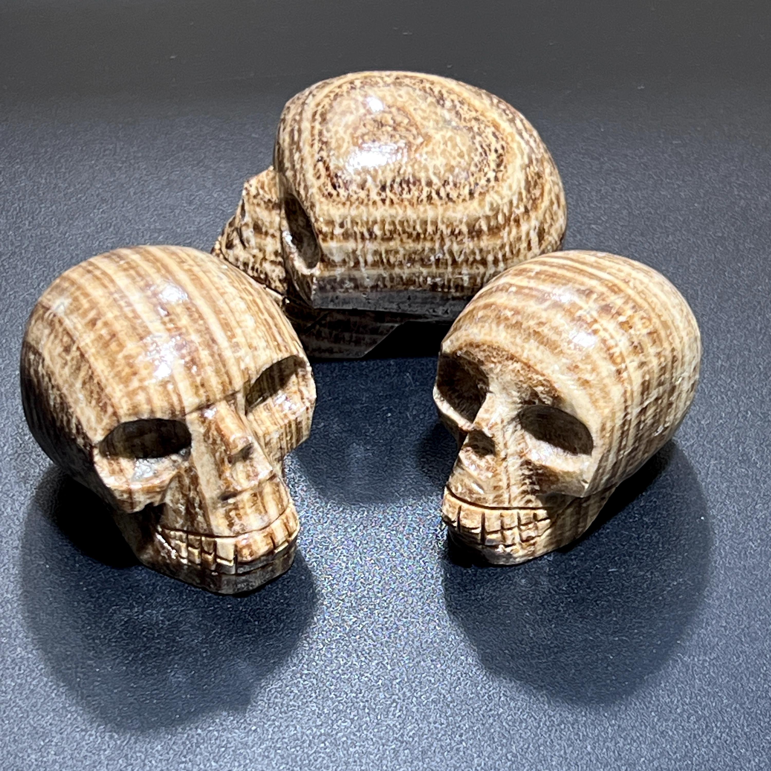 Peruvian Brown Banded Aragonite Skull Carving
